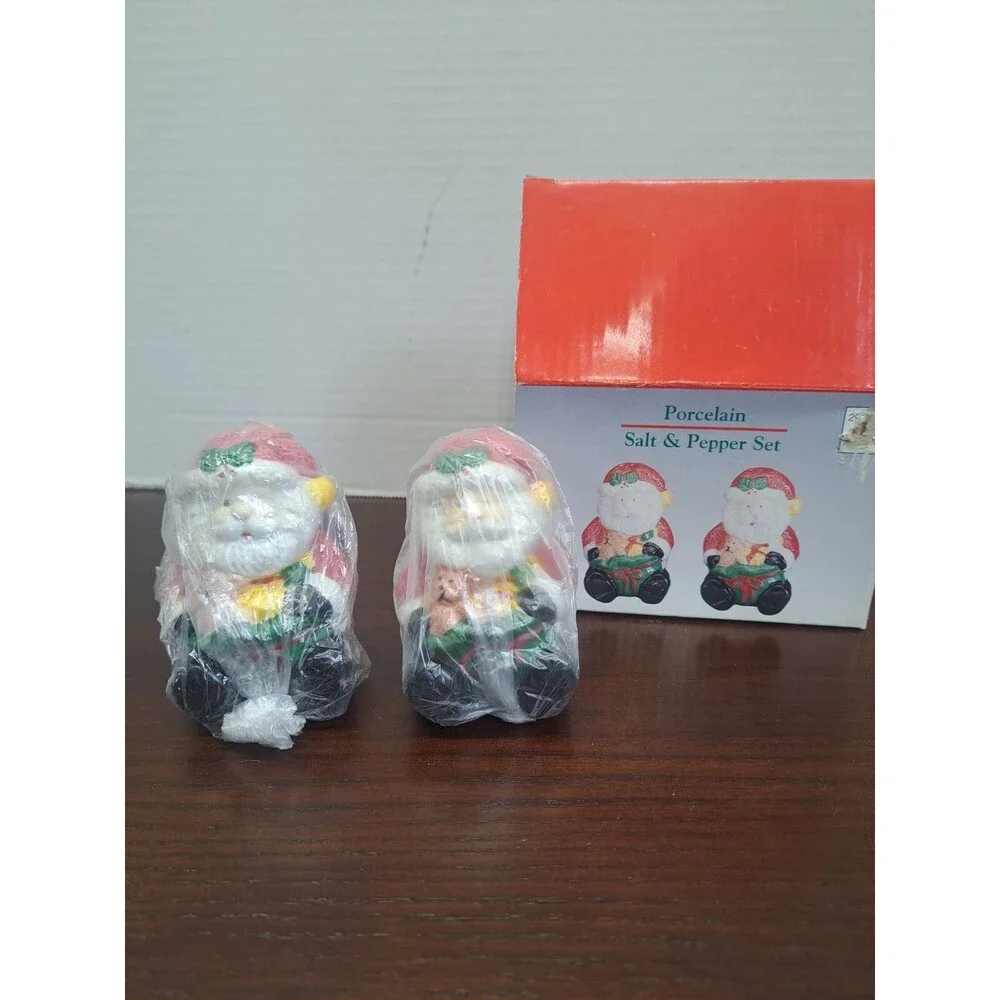 Set Of Porcelain Santa Salt And Pepper Shakers